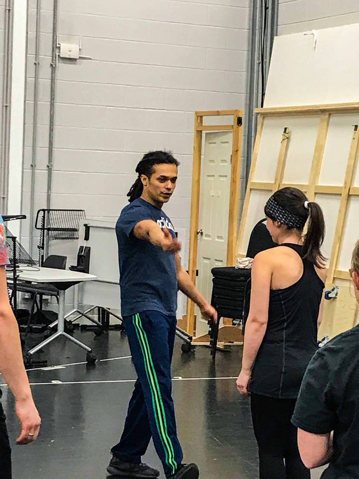 Performer Milton Lopes warming up in the rehearsal room.