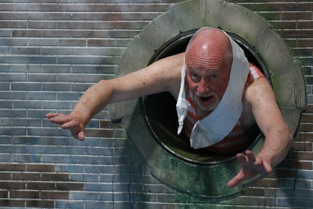 Richard Headon as Grandad dives in to the water through a pipe. 